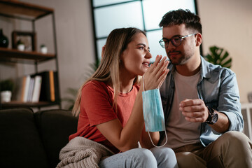 Young woman waiting results from the laboratory. Worried woman waiting Covid-19 test.
