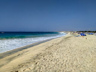 Ocean and sandy beach on sunny day on island Sal, Cape Verde