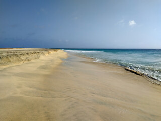 Ocean and sandy beach on sunny day on island Sal, Cape Verde