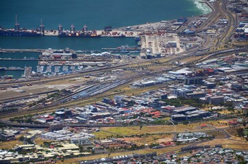 View from Table Mountain to Cape Town, South Africa. View of the city from a bird's eye view, detail of the harbor, railway station, part of the city.