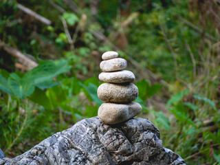 Stacked stones, leaves and nature