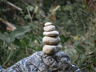 Stacked stones, leaves and nature
