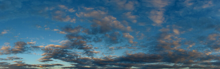 Fototapeta na wymiar Panorama dark sky.Panorama of a twilight sunset and colorful clouds - sunlight with dramatic cloud.