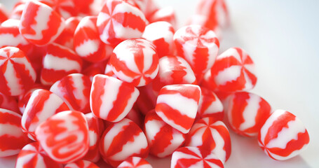Red and White Striped Candy as Sweets Pile as Perfect Unhealthy Food Background. Tasty Desserts. Christmas and New Year Symbol