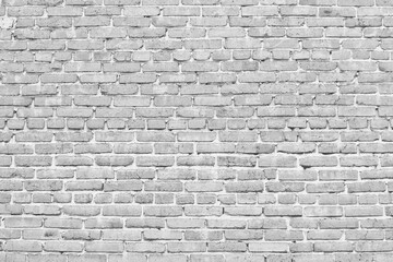 White brick wall. Vintage light background for creative design. The old wall.