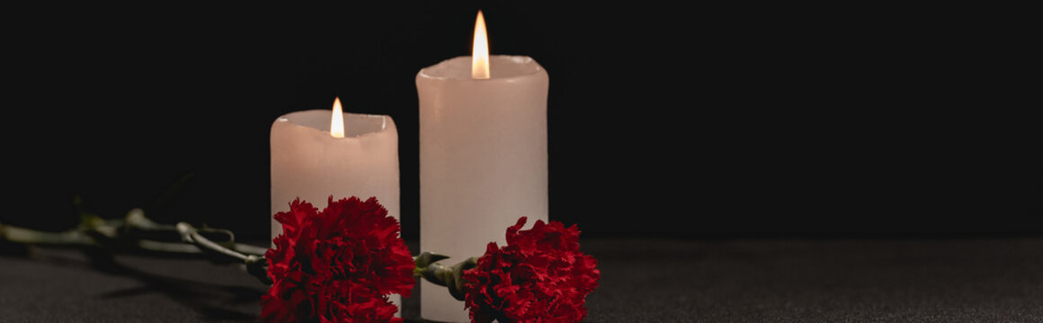 Red Carnation Flowers And Candles On Black , Funeral Concept, Banner