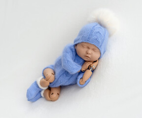 Mannequin of newborn for photo posing