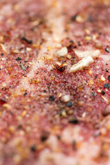 Fresh raw seasoned pork steak meat macro close up shot top view