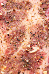 Obraz na płótnie Canvas Fresh raw seasoned pork steak meat macro close up shot top view