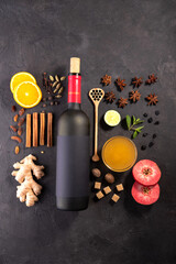 Сhristmas or winter warming drink. .Mulled wine recipe ingredients on black chalkboard