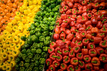 Lots of colorful bell peppers in a supermarket. 