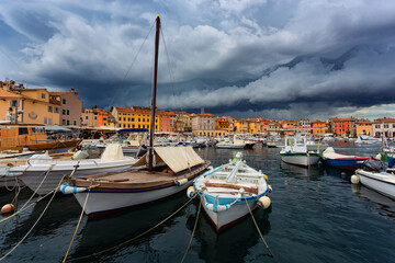 Fototapeta na wymiar storm clouds over marina in Rovinj, Croatia.