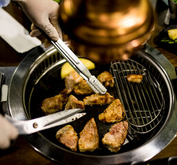 Buffet frying pan with meat