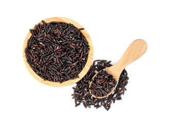 dark violet rice berry with wooden bowl and spoon isolated on white background
