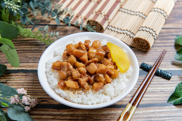 braised pork on rice is Minced pork served with pickles on top of steamed rice