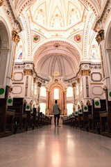 Man in front of the altar
