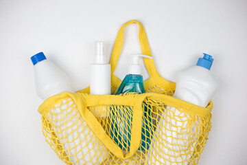 Yellow bag from the store with detergents, household chemicals