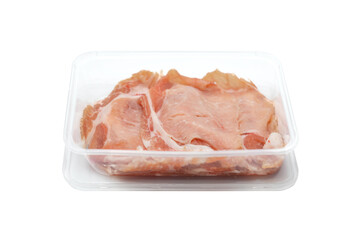 fresh Sliced raw pork in plastic box on white clear background.