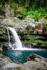 Naklejka na ściany i meble Waterfall on the Langevin river on Reunion Island