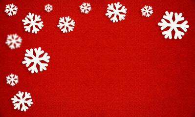Christmas symbols on a red background. The concept of the upcoming Christmas, eve. Snow on the background.