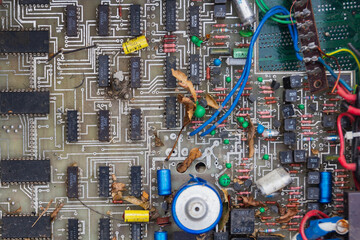 Old computer chip, garbage disposal in a junkyard.