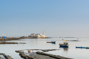 White building of Haji Ali Mosque in Mumbai, built in 1431 and is one of the famous mosques in India