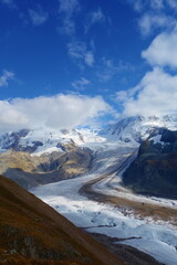 The famous Gorner Glacier in Switzerland, second largest glacier in the Alps. The magnificent panorama of the Pennine Alps with impressive snow capped mountains (Monte Rosa Massive and Liskamm)
