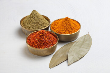 different spices in a metal bowl