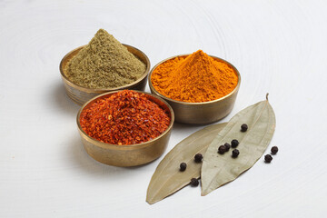 different spices in a metal bowl