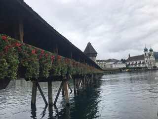 Historic city center of Lucerne with famous Chapel Bridge on Reuss River in Switzerland