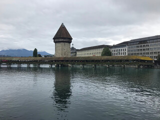 Historic city center of Lucerne with famous Chapel Bridge on Reuss River in Switzerland