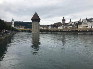 Historic city center of Lucerne with famous Chapel Bridge on Reuss River in Switzerland