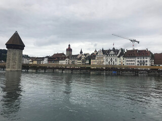 Historic city center of Lucerne with famous Chapel Bridge on Reuss River in Switzerland