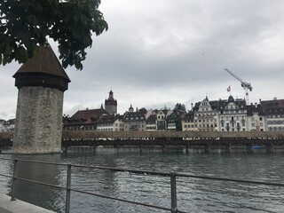 Historic city center of Lucerne with famous Chapel Bridge on Reuss River in Switzerland