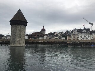 Historic city center of Lucerne with famous Chapel Bridge on Reuss River in Switzerland