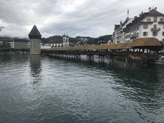 Historic city center of Lucerne with famous Chapel Bridge on Reuss River in Switzerland