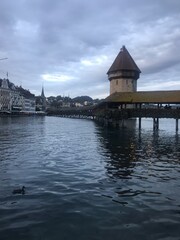 Historic city center of Lucerne with famous Chapel Bridge on Reuss River in Switzerland