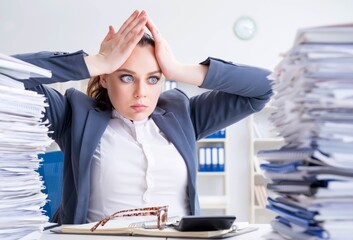 Tired businesswoman with paperwork workload