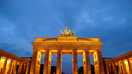 Iconic Brandenburg Gate illuminated in the evening in Berlin, Germany