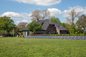 a farmhouse with solar panels