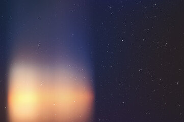Fototapeta premium Lens Optical Flare Film Dust Overlay Effect, Vintage Abstract Bokeh and Light Leaks Photo with Retro Camera Defocused Blur Reflection Bright Sunlights. Use a Screen Overlay Mode for Photo Processing.