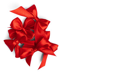 Red bows on a white background. High quality photo