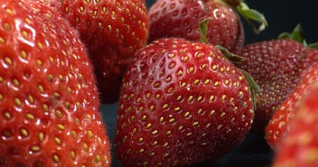 Macro shot of large Strawberries. Strawberry seeds. Shot with Calyx. Strawberries close-up. 