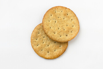 Top view of a stack of biscuits isolated on white background.