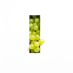 Letter I of English alphabet of fresh grape and cut paper isolated on white. Green berries typeface for festive design