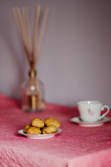 Homemade cookies on a pink tablecloth 