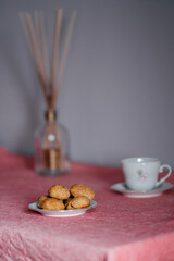 Homemade cookies on a pink tablecloth