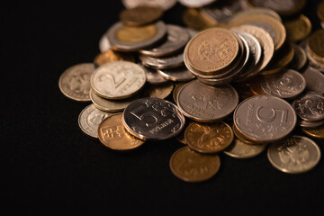 coins on black background, funeral concept, stock image