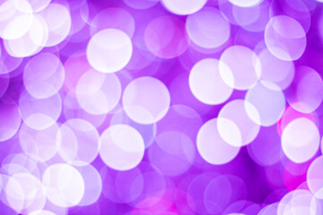 Colorful abstract bokeh background. Purple and white magic light backdrop.