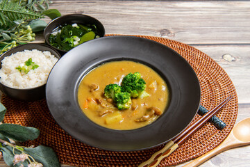 Pork Curry Rice on wooden background (Table decoration)